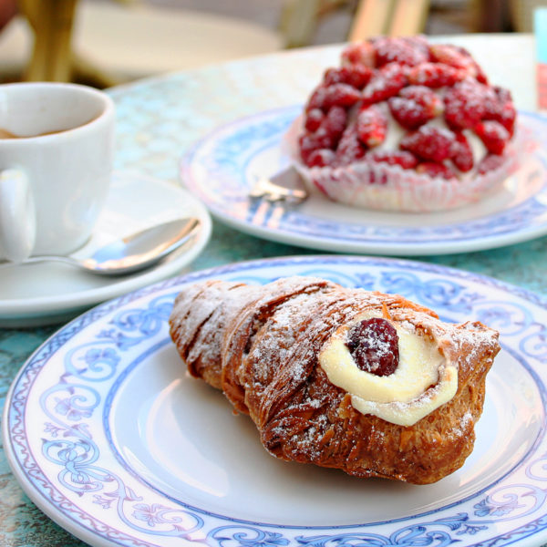 Traditional Neapolitan breakfast, Coda di Aragosta with a cup of coffee and strawberry cake at B&B Perla Beach Stabia